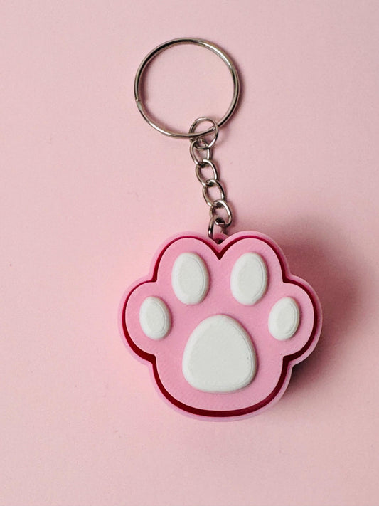 Clickers de patitas de mascota Kokoroto, herramienta de entrenamiento con botón de clic y diseño compacto para mascotas.