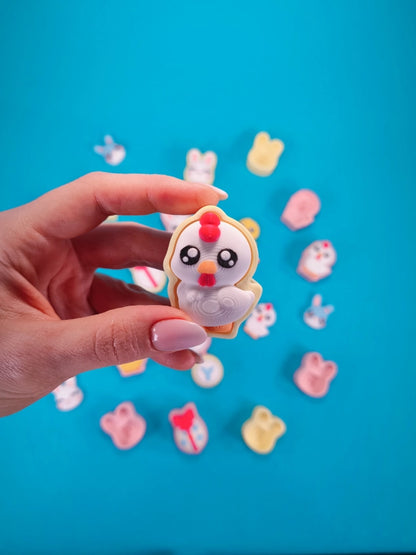 Clickers para celebrar la Pascua de la marca Kokoroto, pequeños dispositivos de plástico con colores brillantes para eventos festivos