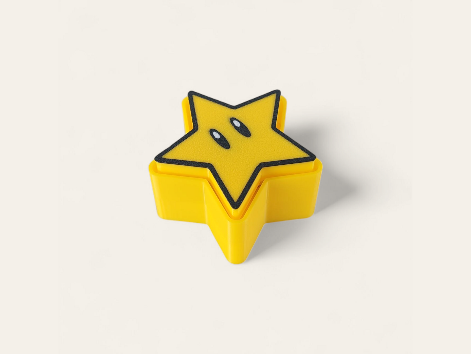 Clicker Power-Up Mario Bros de Kokoroto, botón de juego para niños con personaje de Mario y diseño colorido.