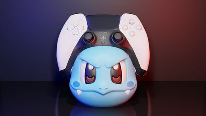 Soporte universal para mandos Kokoroto con diseño de Wartortle, ideal para organizar controles de videojuegos en color azul y gris.