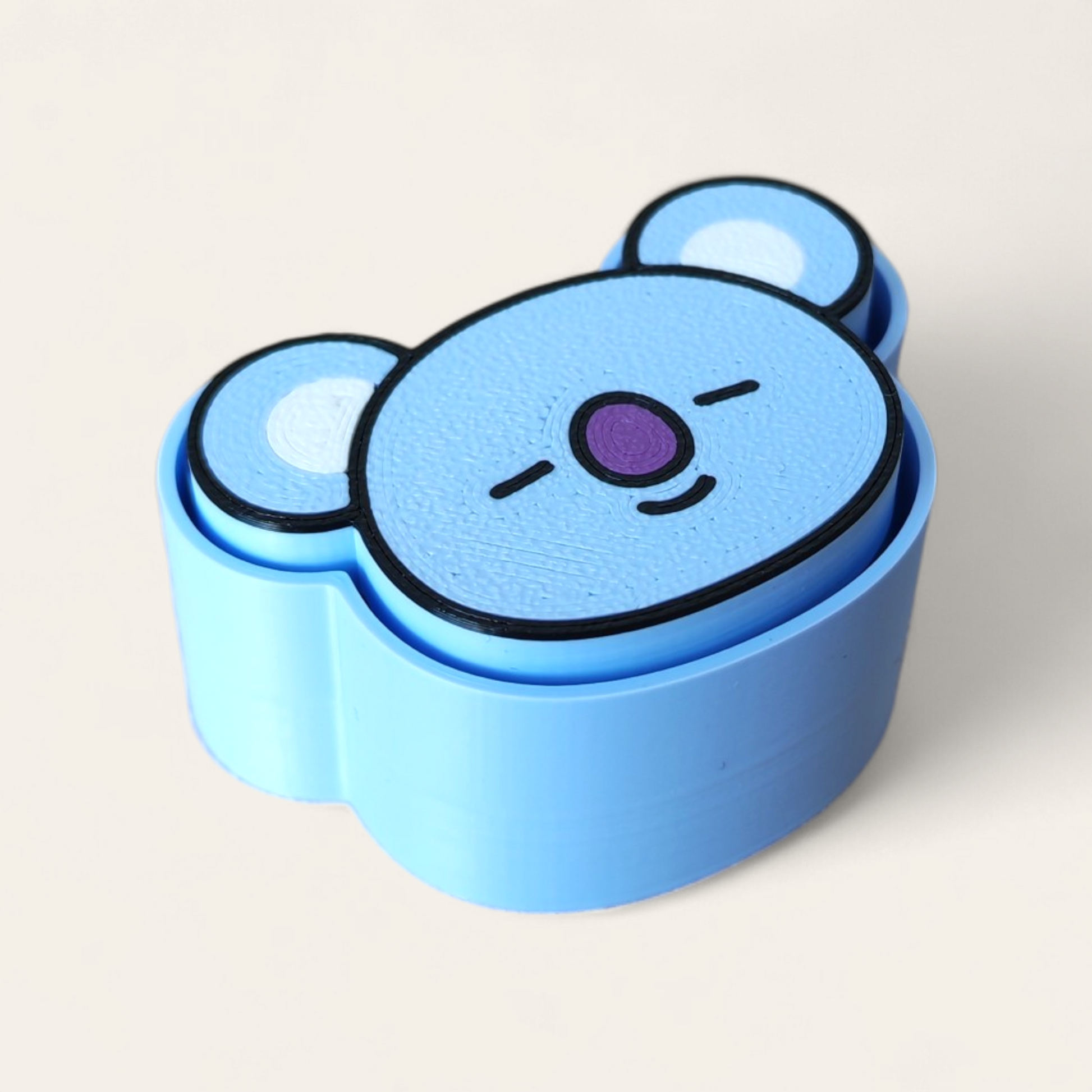 Clicker Kokoroto BT21 Koya, accesorio de entrenamiento en color azul con imagen de Koya de BTS21.