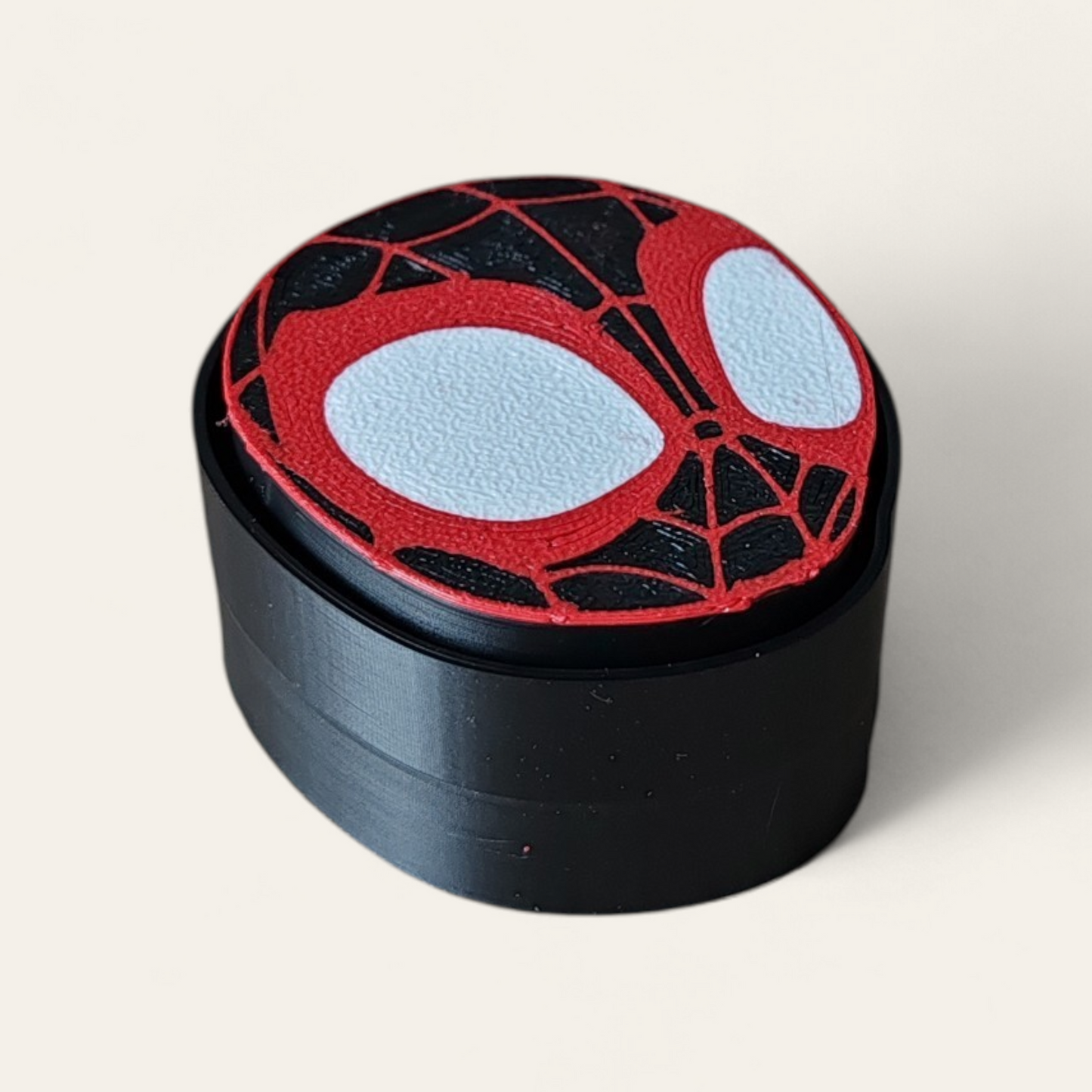 Clickers de Spidey y sus amigos de Kokoroto, en colores variados, con diseño de personajes de superhéroes y fantasmas.