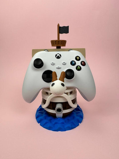 Soporte universal para mandos Kokoroto para PS5, Xbox y Switch, con diseño de One Piece, en color negro y resistente.