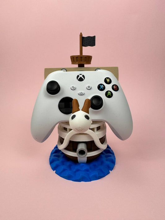 Soporte universal para mandos Kokoroto para PS5, Xbox y Switch, con diseño de One Piece, en color negro y resistente.