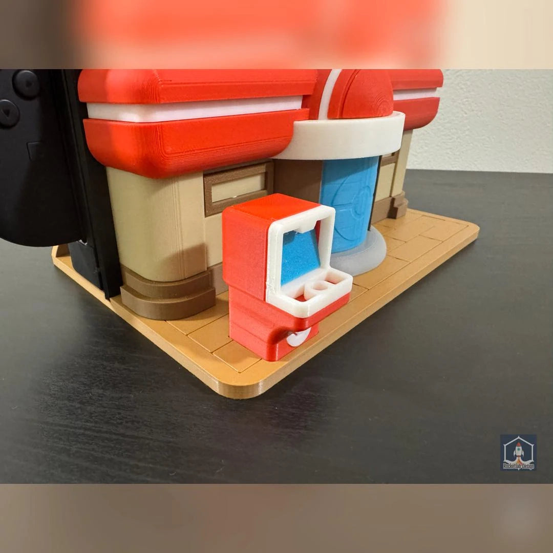 Soporte Kokoroto para Switch 2 con diseño de Pokopia y Pokémon, compatible con dock para consola Nintendo Switch.